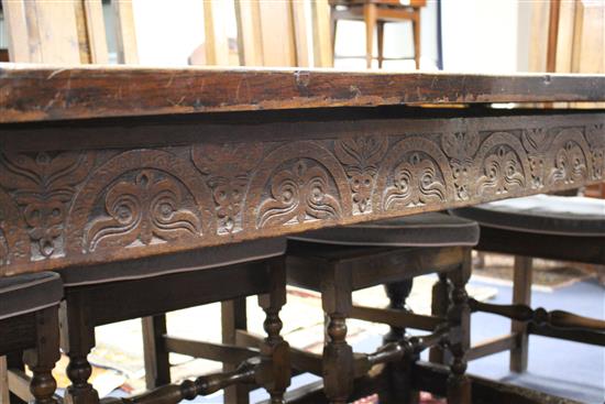 An oak refectory style dining table with cleated four-plank top, W.79cm L.210cm H.75cm